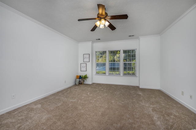 empty room with light carpet, crown molding, and ceiling fan