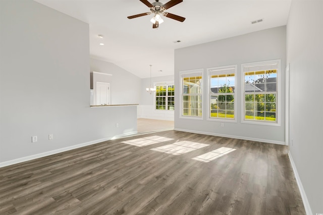 unfurnished living room featuring dark hardwood / wood-style flooring, ceiling fan with notable chandelier, and lofted ceiling