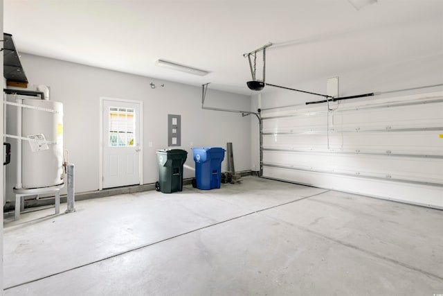 garage with electric panel, water heater, and a garage door opener