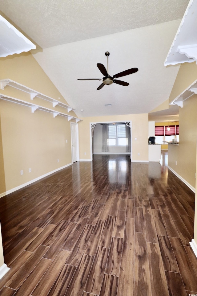 196 Marsh Hawk Dr, Myrtle Beach, SC 29588 - unfurnished living room with wood finished floors, ceiling fan, and vaulted ceiling