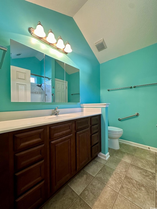 196 Marsh Hawk Dr, Myrtle Beach, SC 29588 - full bathroom featuring lofted ceiling, vanity, a shower, tile patterned flooring, and a textured ceiling