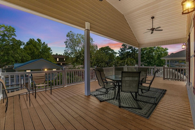 deck at dusk with ceiling fan