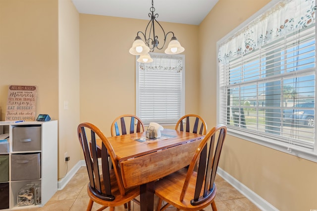 237 Cloverleaf Dr, Longs, SC 29568 - dining room featuring baseboards, light tile patterned floors, and a notable chandelier