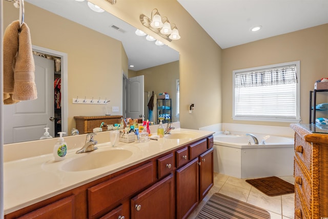 237 Cloverleaf Dr, Longs, SC 29568 - bathroom featuring double vanity, tile patterned flooring, a sink, and a garden tub