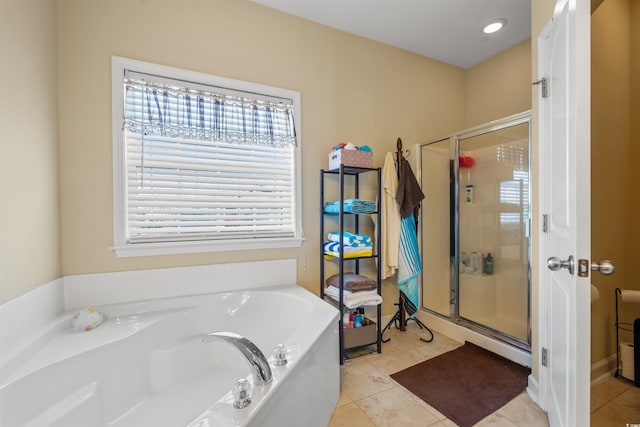 237 Cloverleaf Dr, Longs, SC 29568 - bathroom with tile patterned flooring, a shower stall, and a garden tub