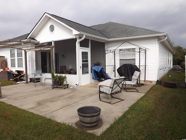 237 Cloverleaf Dr, Longs, SC 29568 - rear view of house with a patio area and roof with shingles