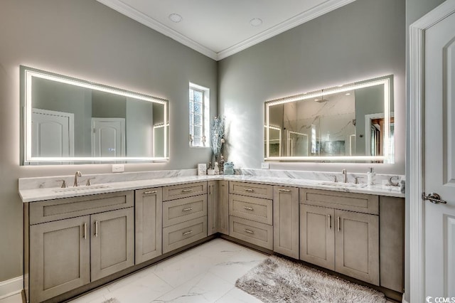 bathroom featuring marble finish floor, walk in shower, ornamental molding, and a sink