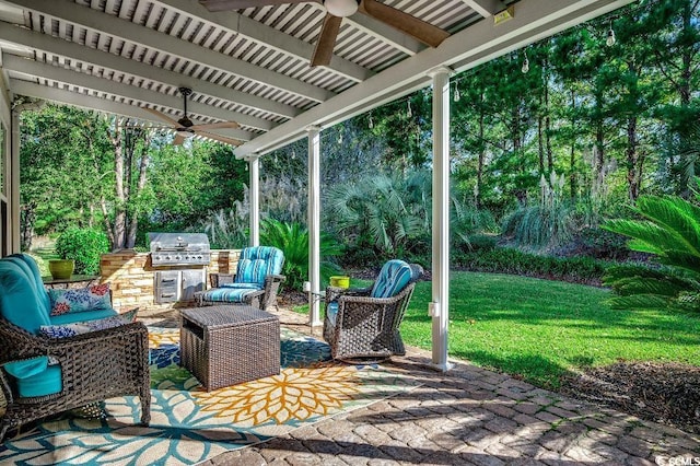 view of patio featuring area for grilling, an outdoor kitchen, and ceiling fan