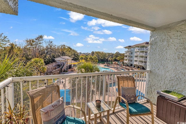 balcony with view of pool area