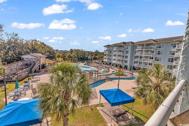 view of swimming pool with a patio area