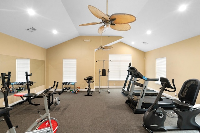 exercise room featuring ceiling fan and vaulted ceiling