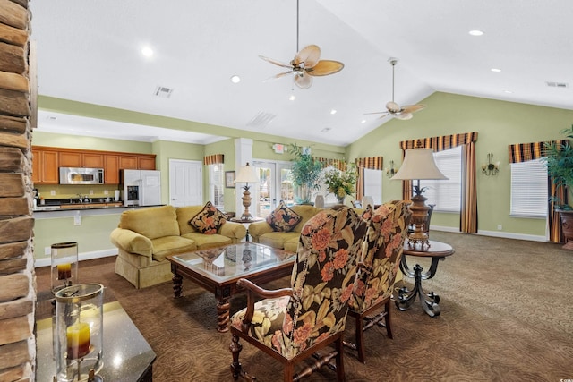 living room with vaulted ceiling, french doors, dark colored carpet, and ceiling fan