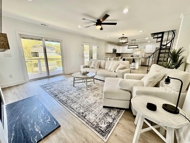 37 Geney Ln, Pawleys Island, SC 29585 - living area with ceiling fan, crown molding, baseboards, recessed lighting, and light wood-style flooring