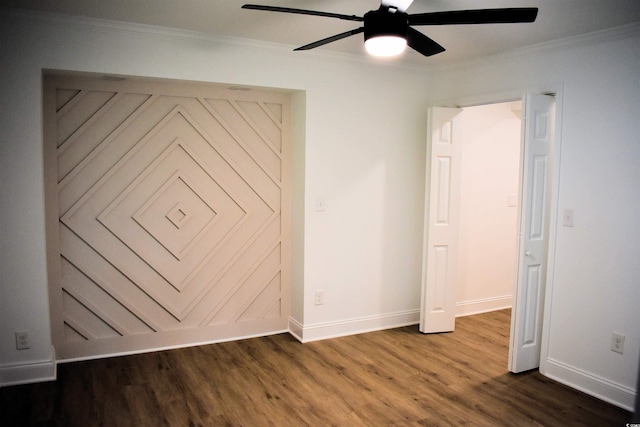 unfurnished bedroom with ceiling fan, crown molding, baseboards, and wood finished floors