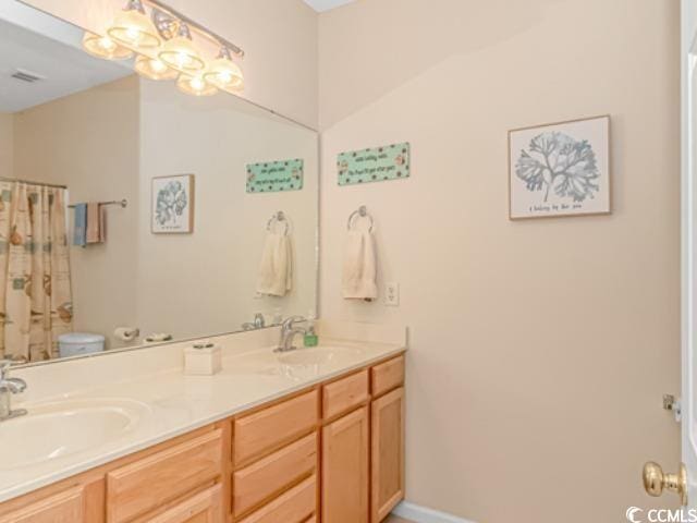 5804 Longwood Dr Unit 203, Murrells Inlet, SC 29576 - bathroom featuring double vanity and curtained shower