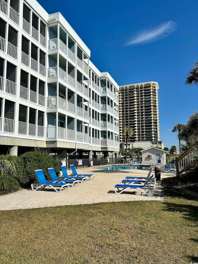 view of property with a community pool