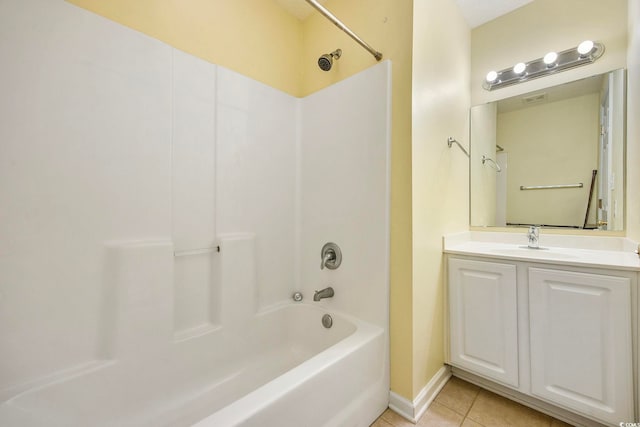 bathroom with vanity, tile patterned flooring, and shower / bathtub combination