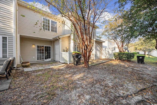 back of property featuring a patio area