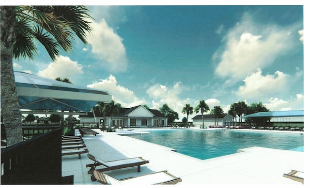 view of swimming pool featuring a patio area