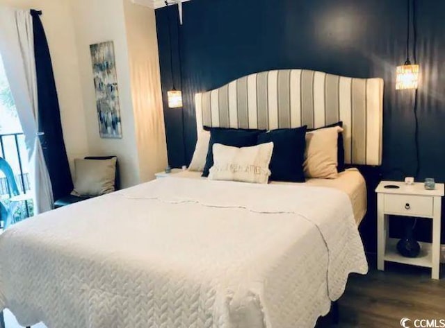 bedroom featuring dark wood-type flooring