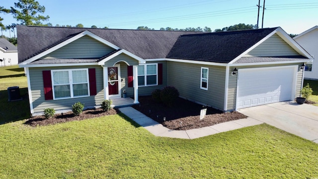 ranch-style home with a front lawn and a garage