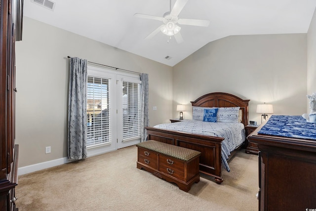 carpeted bedroom featuring access to outside, lofted ceiling, and ceiling fan