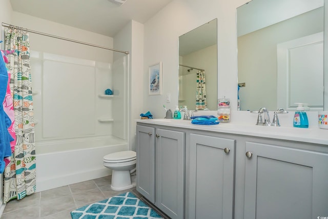 full bathroom with toilet, vanity, tile patterned floors, and shower / bathtub combination with curtain