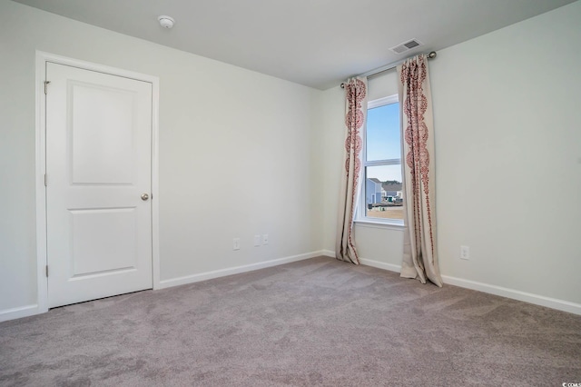 view of carpeted spare room