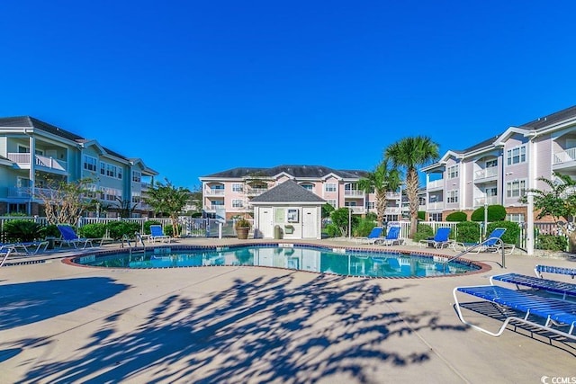 view of pool featuring a patio