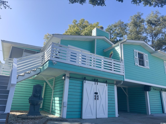 3936 Murrells Inlet Rd, Murrells Inlet, SC 29576 - view of front of property featuring a chimney and a wooden deck