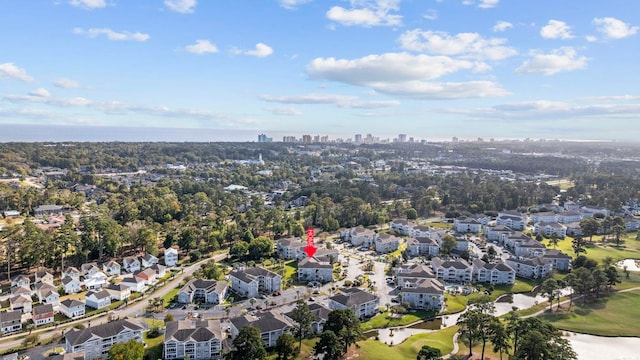 birds eye view of property with a residential view