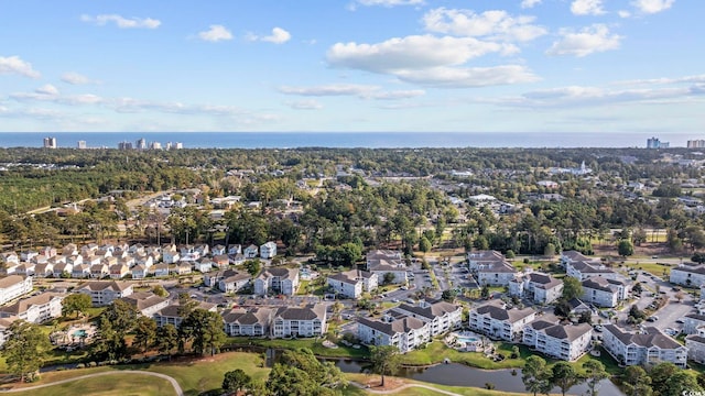 bird's eye view with a water view and a residential view