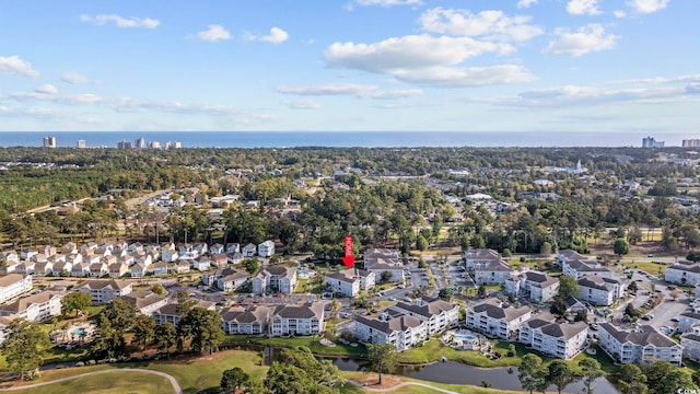 birds eye view of property with a residential view and a water view