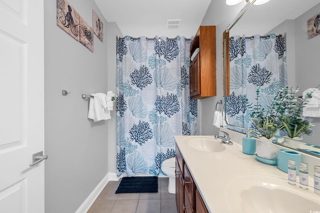 bathroom with vanity, a shower with curtain, toilet, and tile patterned flooring