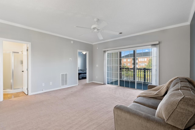 carpeted living room with crown molding, a textured ceiling, and ceiling fan