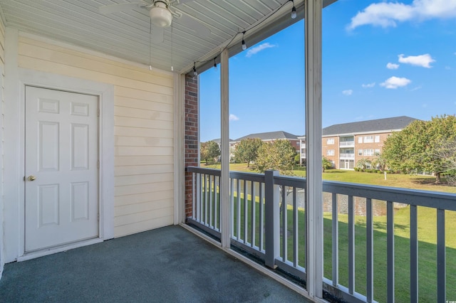 balcony featuring ceiling fan