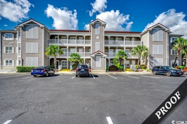 4220 Coquina Harbour Dr Unit B-11, Little River, SC 29566 - view of property with uncovered parking