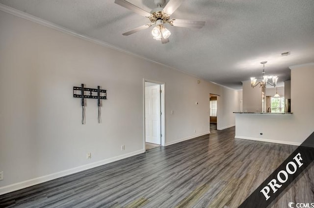 4220 Coquina Harbour Dr Unit B-11, Little River, SC 29566 - unfurnished living room with dark wood-style flooring, a textured ceiling, ornamental molding, a chandelier, and a ceiling fan