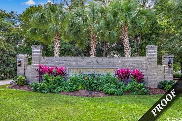 4220 Coquina Harbour Dr Unit B-11, Little River, SC 29566 - community sign featuring a lawn