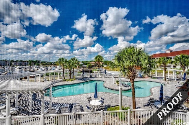 4220 Coquina Harbour Dr Unit B-11, Little River, SC 29566 - community pool with a patio area