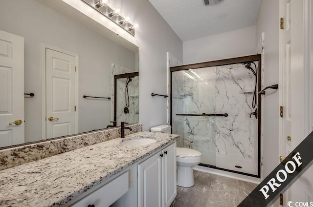 4220 Coquina Harbour Dr Unit B-11, Little River, SC 29566 - bathroom featuring a marble finish shower, vanity, and marble look tile flooring