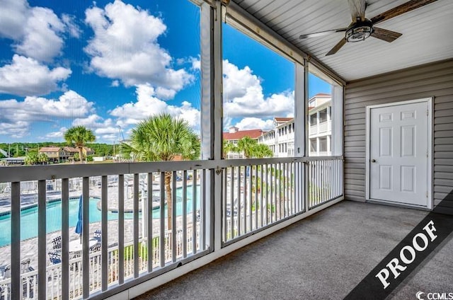 4220 Coquina Harbour Dr Unit B-11, Little River, SC 29566 - balcony with a ceiling fan and view of pool area