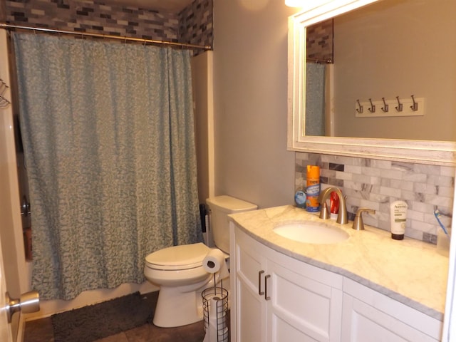 full bathroom featuring vanity, toilet, shower / bath combo, and tasteful backsplash