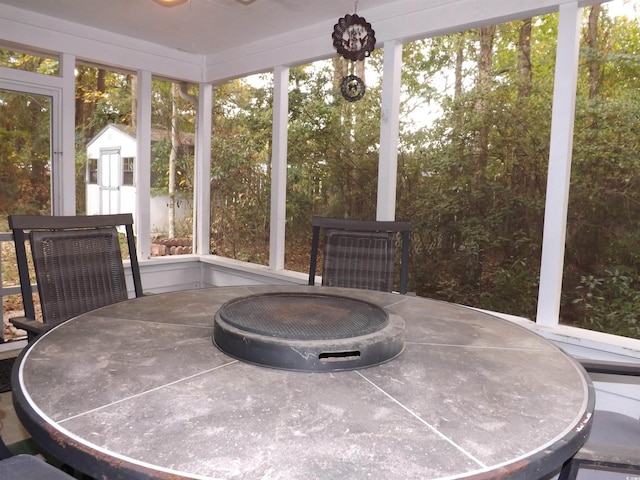 sunroom with plenty of natural light