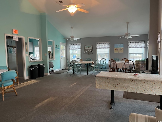 playroom with carpet flooring, a wealth of natural light, high vaulted ceiling, and ceiling fan