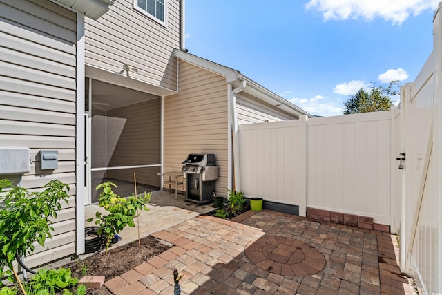 view of patio with a grill