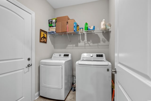 washroom with separate washer and dryer