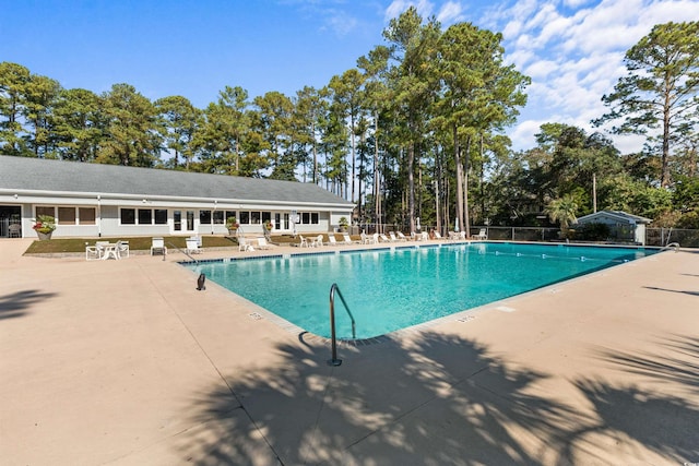 view of swimming pool featuring a patio