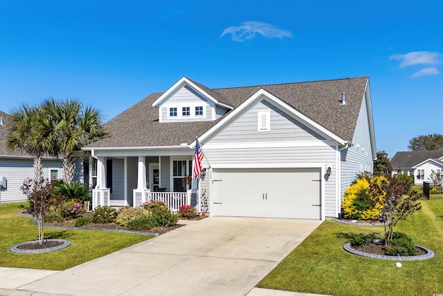 craftsman inspired home featuring a porch, a front yard, and central AC