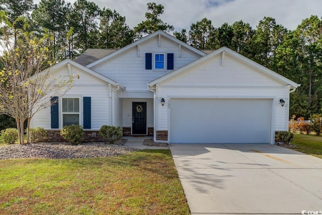 view of front facade with a garage and a front lawn